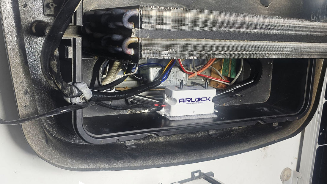 AIRLOCK unit installed inside an RV rooftop air conditioner compartment