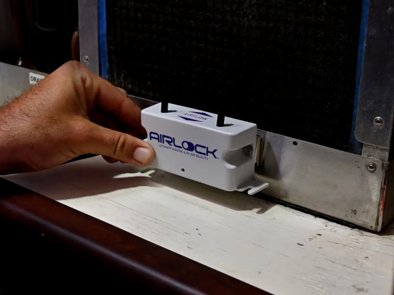 Hand mounting AIRLOCK One at a boat AC air handler